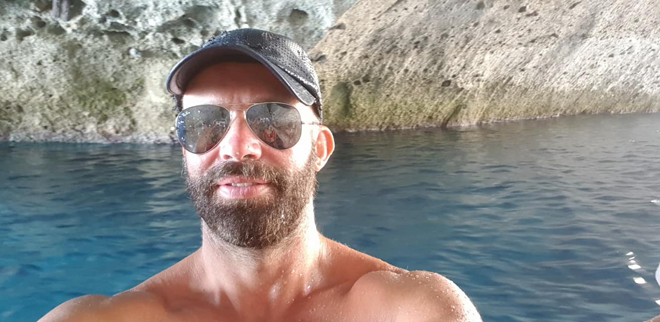 Yannis Divramis, owner of Greece Tours Online, in a sea cave at Kleftiko, Milos